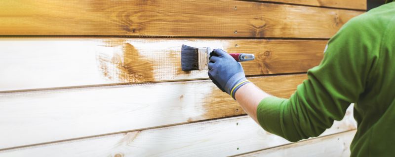 Painting of siding on a residential home